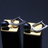 Cultured Freshwater Pearl earrings In sterling silver