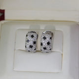 N Stud Earrings In Sterling Silver
