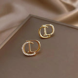 D Earrings In Sterling Silver